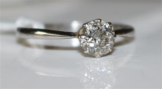 Platinum and solitaire diamond ring